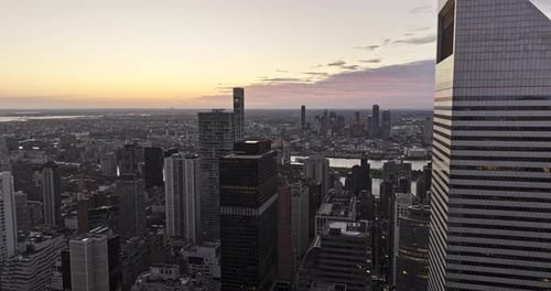 NYC New York Aerial v359 drone flyover through Midtown Manhattan skyscrapers towards East river capt