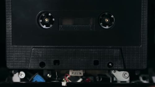 Retro Radio Tape Recorder Audio Cassette Closeup Listening to Music Old Radio Boom Box Player Macro