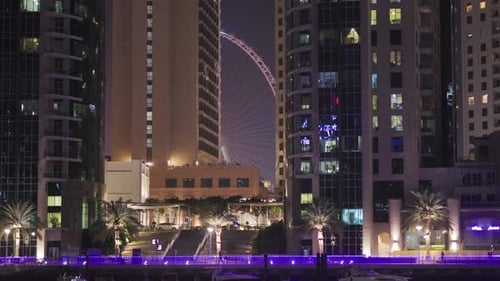 Ain Dubai Ferris wheel seen behind buildings, Dubai