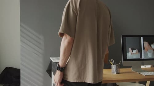 Product Photography Setup with Woman and Photographer