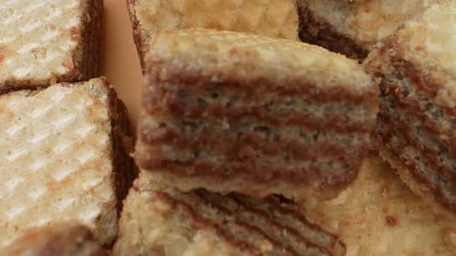 Chocolate Wafer Squares on the floor in macro video