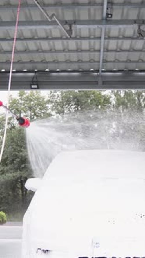 Car Wash Experience Witness the Revitalizing Process of Spray Cleanup in Action As Each Car is