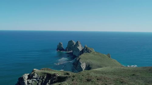 Aerial Panoramic View of Cliffs and Huge Rocks at Seaside and Waves Crashing to the Coast Beautiful