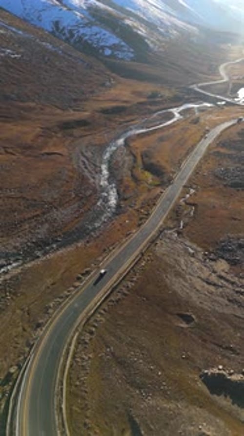 Aerial view of road through mountains, Pakistan.