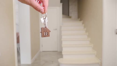 Real Estate Agent Giving Keys to Female Homeowner Strong Independent Woman Succeeds Buying Her Own