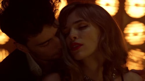 Sexy Man Hugging Beautiful Girl Dancing in Night Club Close Up. Portrait