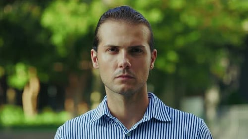 Serious Young Man Portrait in Urban Outdoor Setting