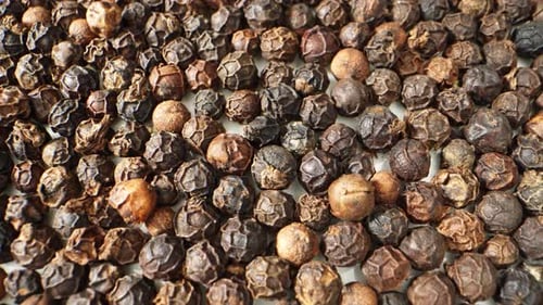 World of black pepper up close with a macro probe lens.