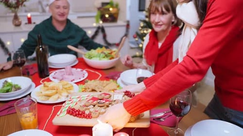 Family Celebrates Christmas Feast at Home