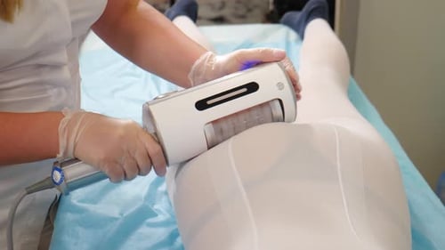 Female Doctor Holding Lymphatic Drainage Massager for Weight Loss Cosmetologist Uses Endosphere