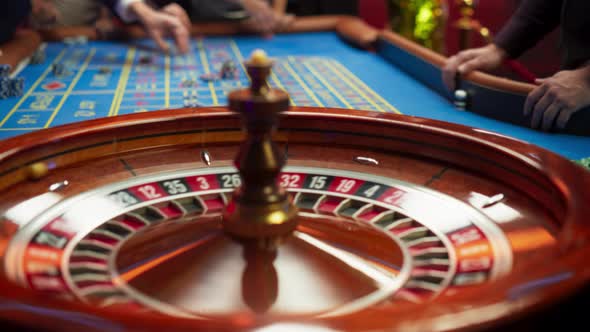Close Up Footage of a Spinning Roulette Wheel. Focus Switching to an ...
