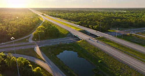 American Highway Bridge and Exit Lanes Forming Rural Interchange with Continuous Vehicle Movement at