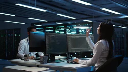 Engineer Using Augmented Reality Tech in Data Center Installing Software