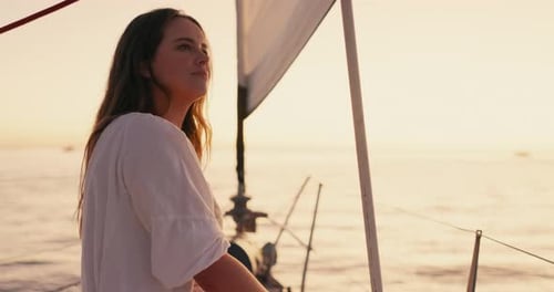 Travel, relax and sunset with woman on yacht for sailing, adventure and summer vacation