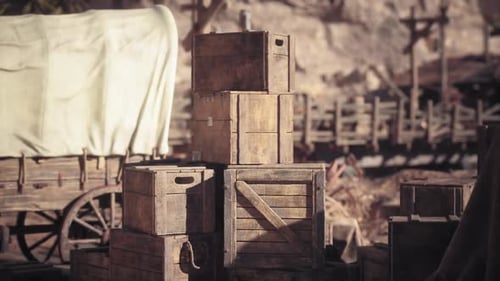 Rustic Wooden Crates and Covered Wagon Video Background