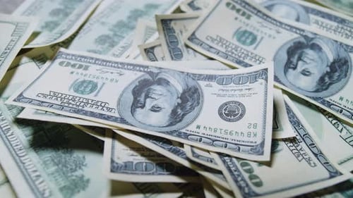 Pile of United States One Hundred Dollar Bills