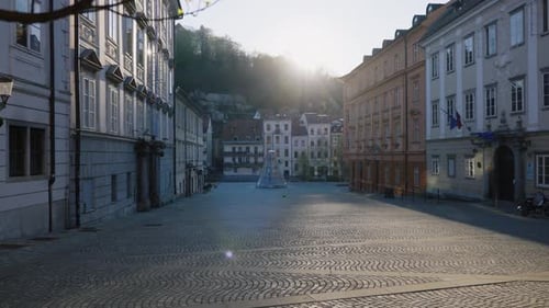 Old Town Charm Peaceful City Square at Sunrise with Historic European Buildings