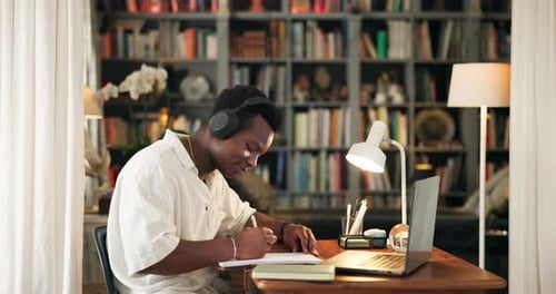 Books, library and man with headphones on laptop for online learning, studying and education