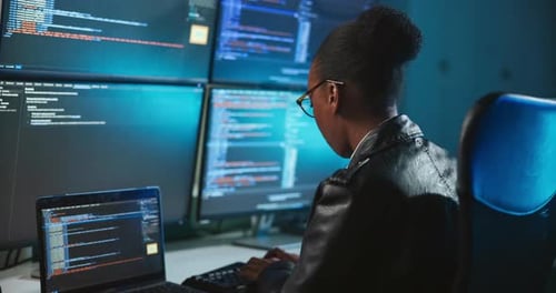 Black woman, computer screen and programming for cybersecurity at office