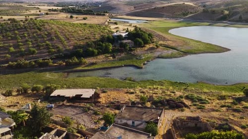Aerial Video of Peaceful Village Near River in Rural Landscape