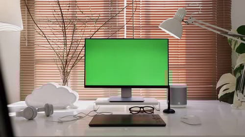 Dolly out computer display monitor with green screen chroma key mock-up.