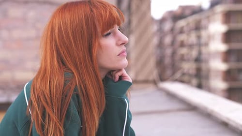 portrait of a woman looking down sadly thinking about her relationship problems