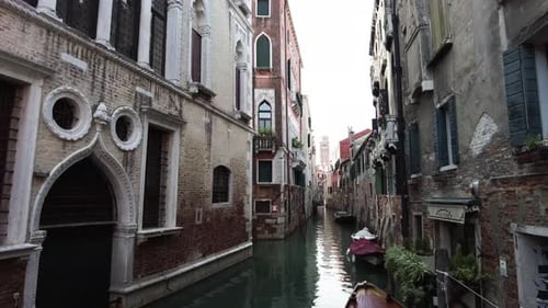 Empty Waterways With Gondola Boats On The Historic Town Of Venice, Italy. Static Shot