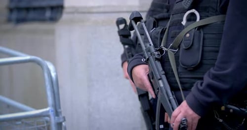 4k security officers with rifle london terror attack slow motion