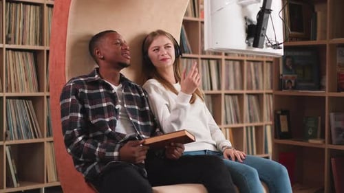 Friends Discuss Educational Movie Seen in Library