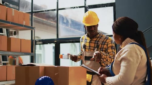 Group of Warehouse Employees Preparing Containers