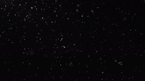 Abstract falling snow on black background for compositing