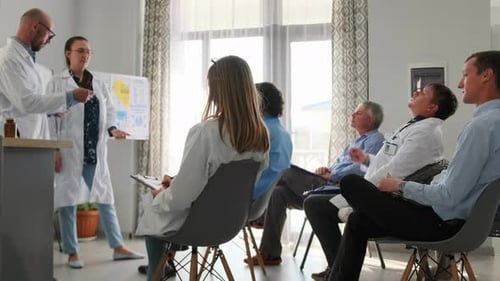 Medical Staff Arguing Ideas at Hospital Training Seminar