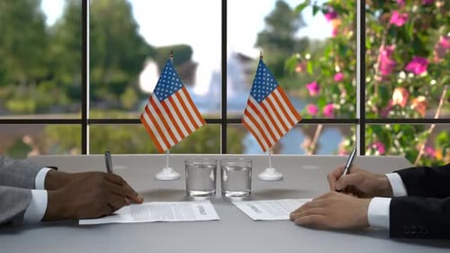 Business Deal Signed, Handshake with US Flags