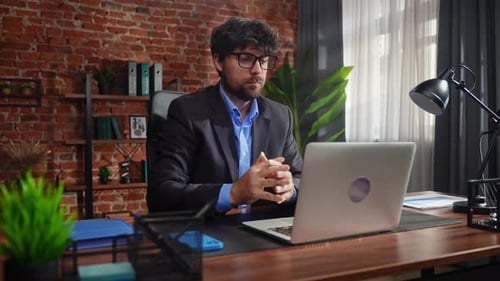 Business Professional Working in Modern Office Setting