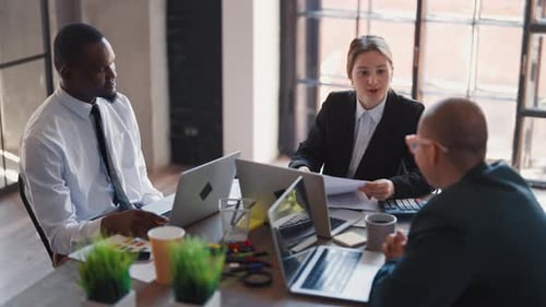 Conference with Colleagues or Partners in Office Business Meeting Diversity Teamwork and
