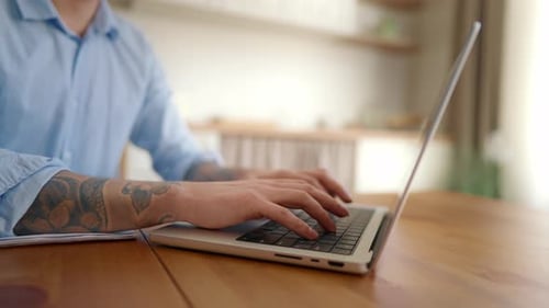 Man Typing on Laptop Keyboard at Home Close Up Hands of Business Person Typing Texting on Laptop