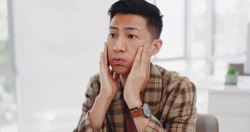 Business, stress and Asian man thinking, frustrated and depression in office