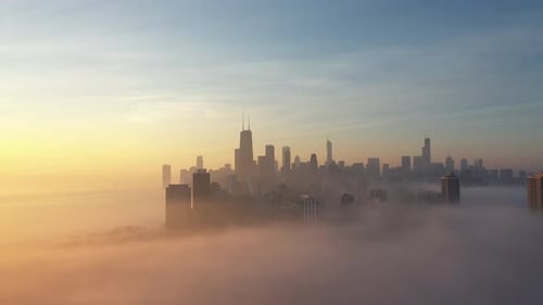 Chicago foggy aerial footage from a drone top view gold coast, north ave beach