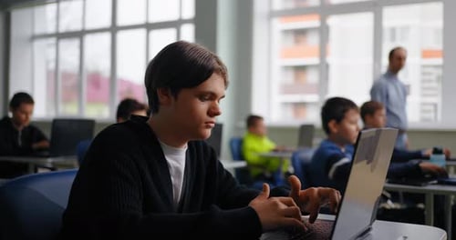 Teen Boy Learning Computer Science In School Portrait Of Pupil Working With Laptop Smart Children