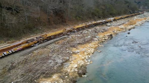 4K Aerial Drone Video of Train Loaded with Debris from Hurricane Helene Stranded on Track Along Fren