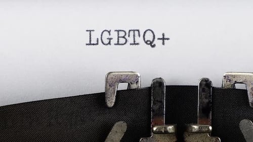 LGBTQ+ typed on an old typewriter