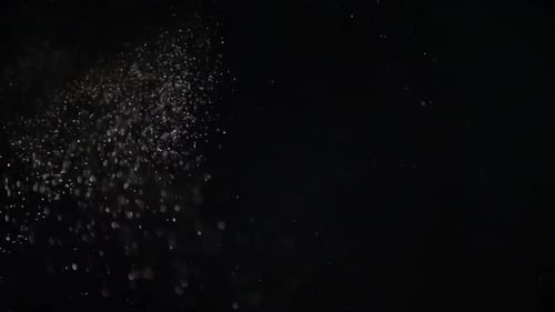 Abstract Shot of Sparkling Particles on Black Background