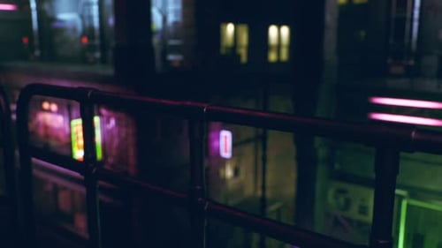 Neon Lights Illuminate Urban Landscape at Night in Vibrant City Setting