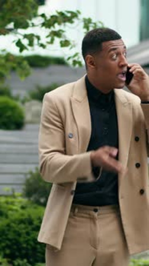 Angry African American Business Man Talking on Mobile Phone in City Downtown Frustrated Mad