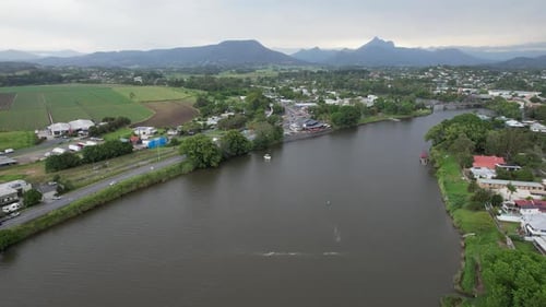 Tweed River With Foggy Mountain Views In Distance. Murwillumbah, New South Wales, Australia. aerial