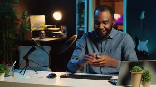 Young Adult Explains Computer Keyboard in Studio