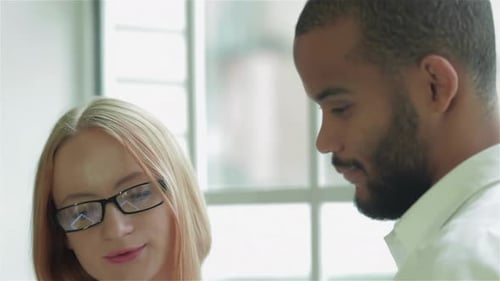 Doctor Discusses Tablet with Patient in Hospital