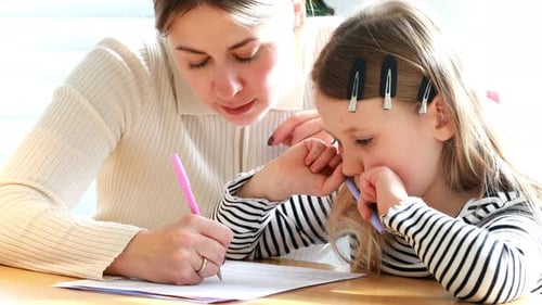 Mom Teaches Her Daughter to Write Words Help with School Homework Elementary School