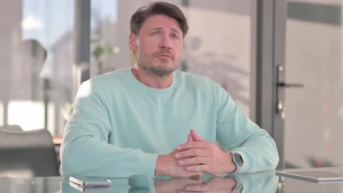 Pensive Middle Aged Man Thinking New Solutions