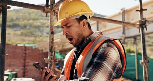 Construction site, man and phone with yawn for fatigue, renovation and civil engineering